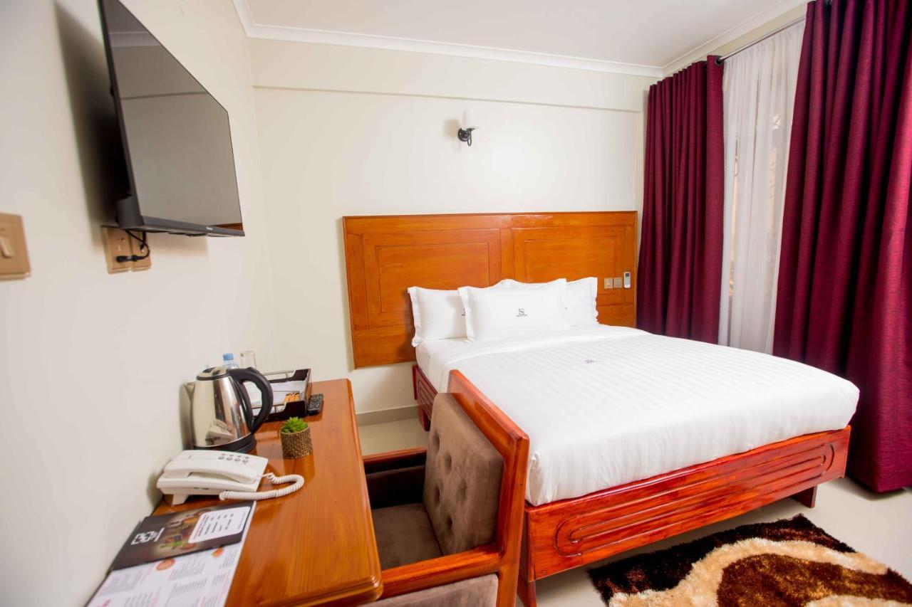 Hadjens Hotel Mwanza Buitenkant foto
